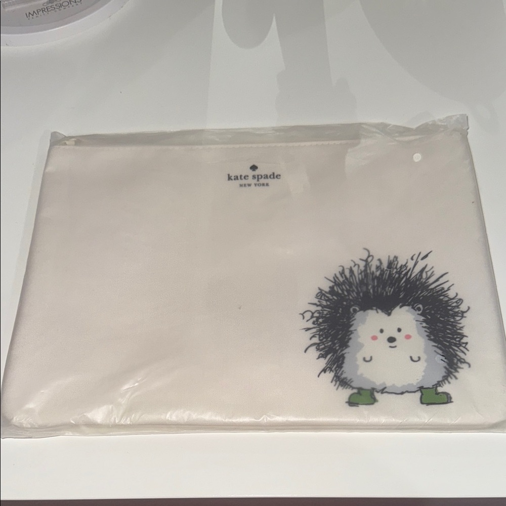 Kate Spade White Pouch with Hedgehog Motif